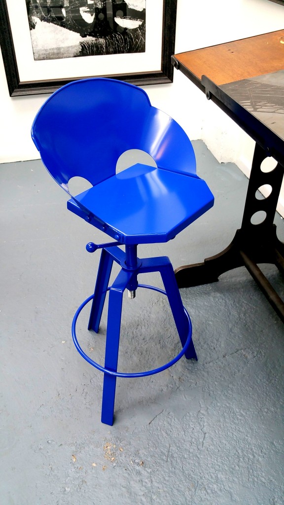 Beaten black and blue handmade industrial steel stool, in blue
